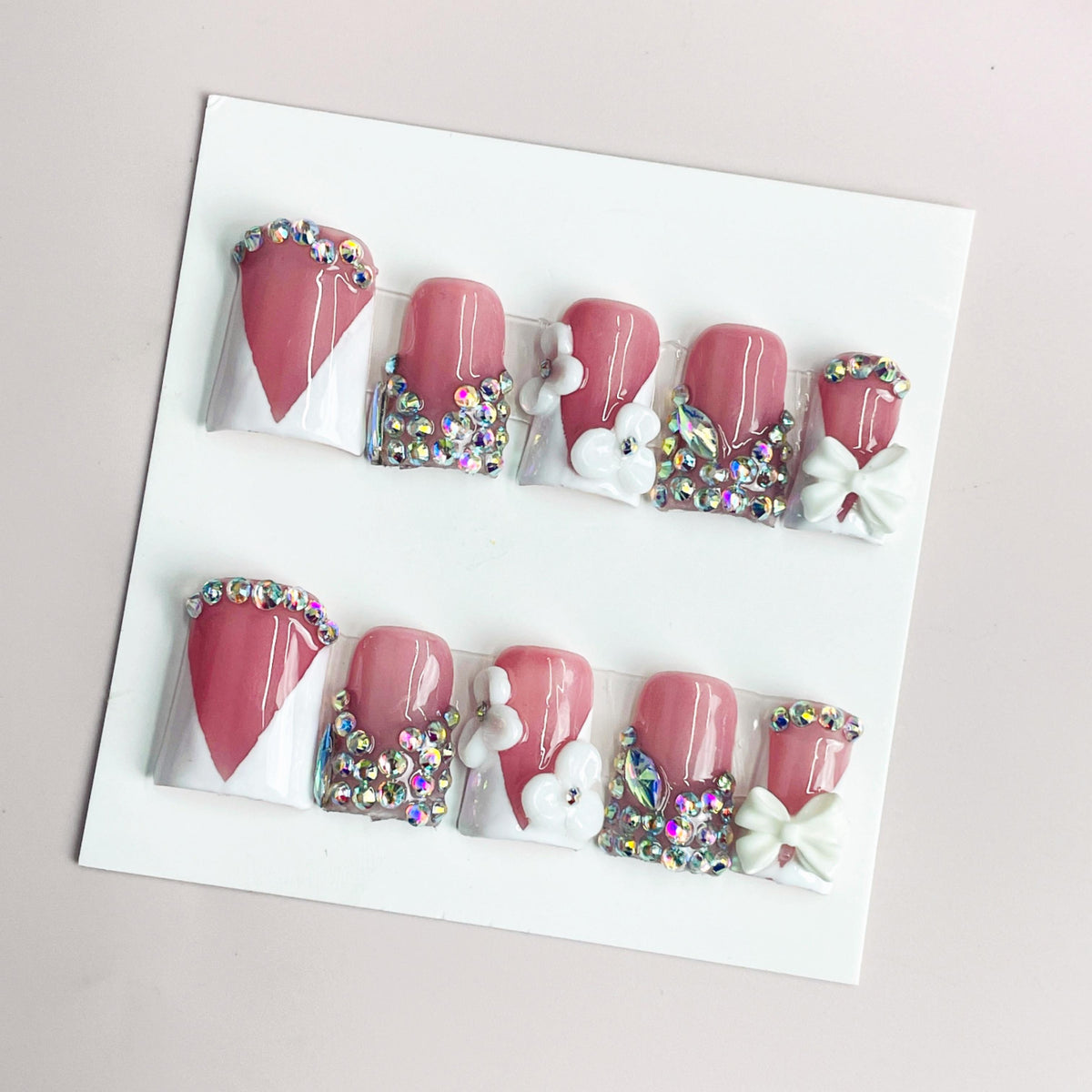Duck Press On Nails - Dusty pink, white v-cut tips, iridescent rhin...