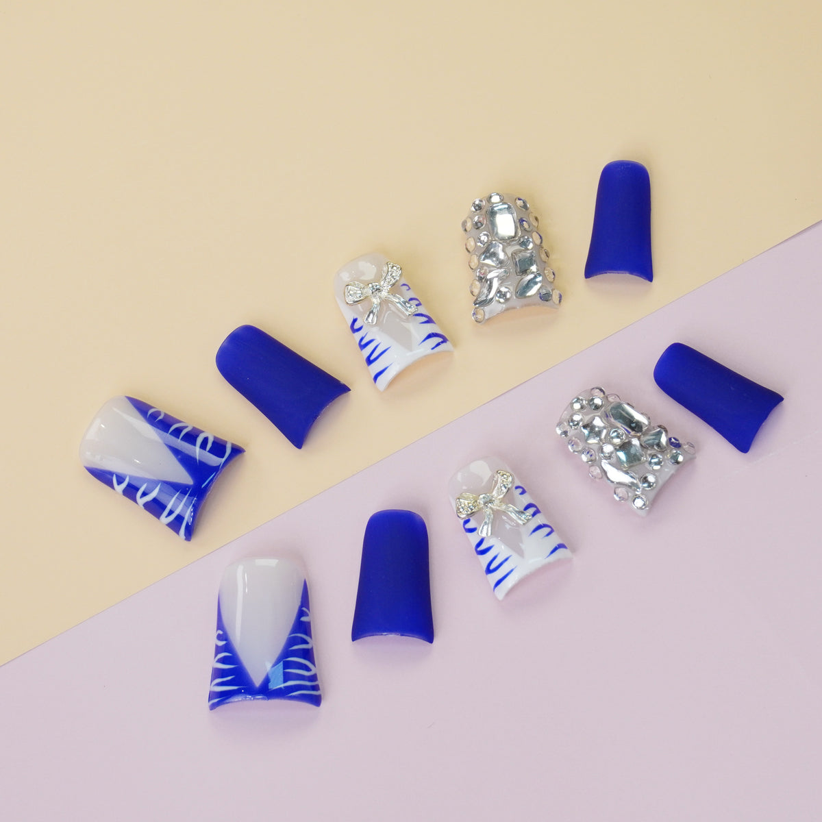 Duck Press On Nails - Royal blue matte, white zebra v cut tips, rhi...