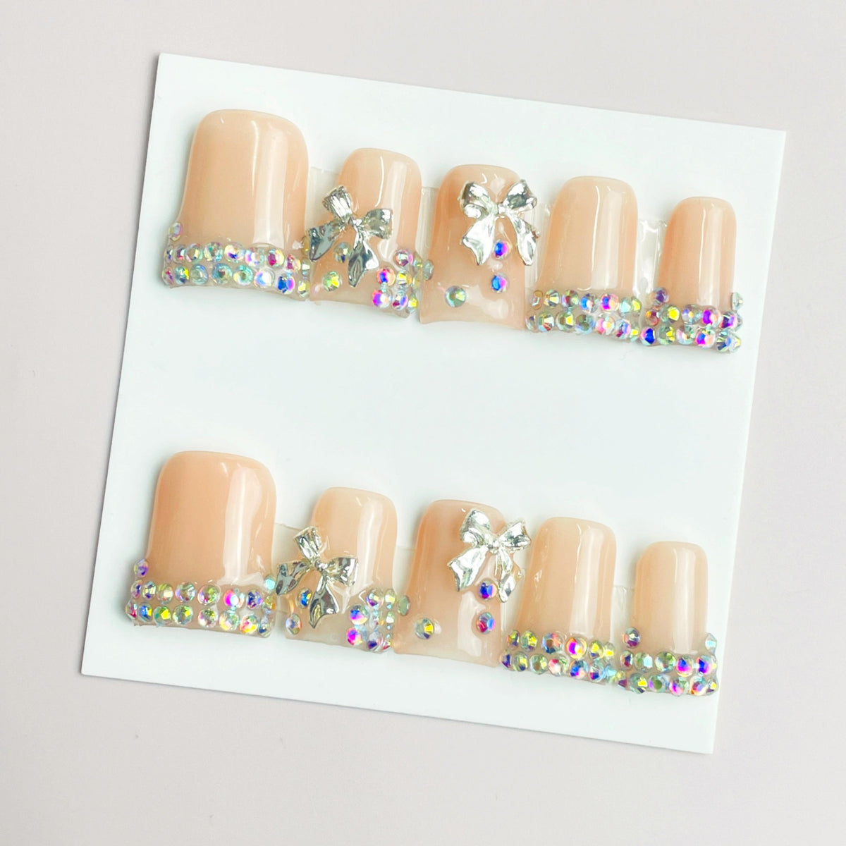 Duck Press On Nails - Nude marble design, rhinestone gold star decor